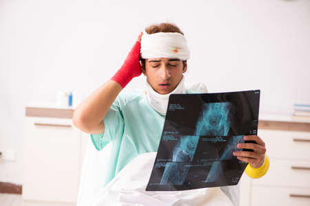 Young injured man staying in the hospital