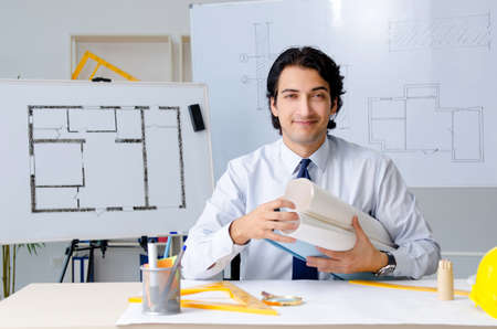 Young handsome architect working on the projectの写真素材