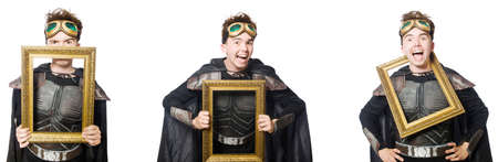 Young funny man in armour suit