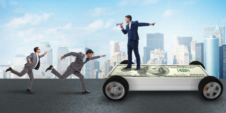 Businessman in the business concept with dollar carの写真素材