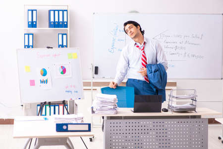 Male sales analyst in front of the whiteboardの写真素材