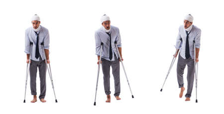 Injured businessman isolated on whiteの写真素材