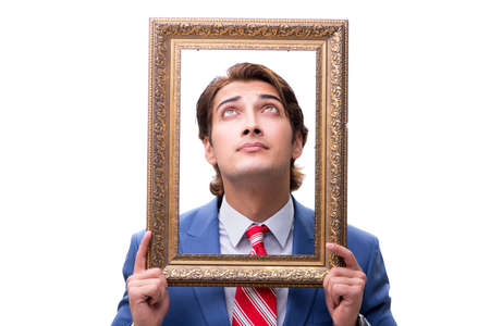 Elegant businessman with picture frame isolated on whiteの写真素材