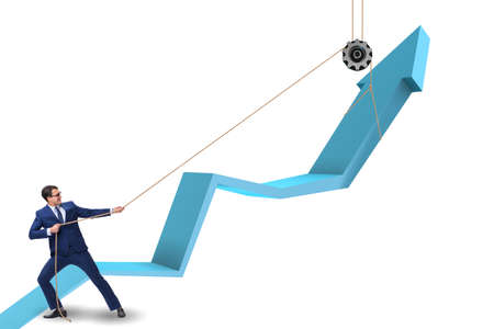 Businessman supporting economic growth by pulling ropeの写真素材