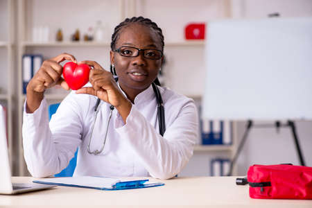 Black female doctor working at clinicの写真素材