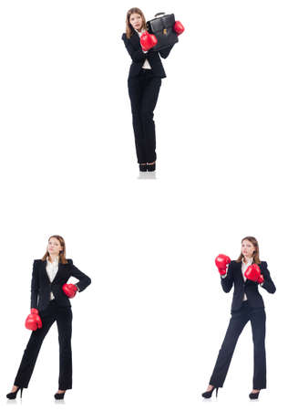 Businesswoman with boxing gloves isolated on whiteの写真素材