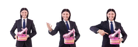 Man with woman shoes isolated on whiteの写真素材