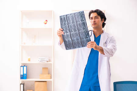 Young male doctor radiologist working at the clinic