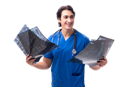 Young handsome doctor radiologist isolated in white