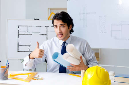 Young handsome architect working on the projectの写真素材