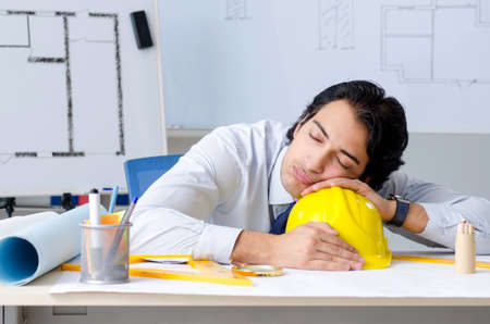 Young handsome architect working on the projectの写真素材