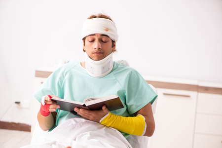Young injured man staying in the hospital