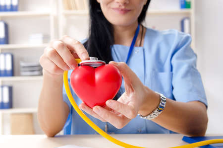Female doctor cardiologist working in the clinic