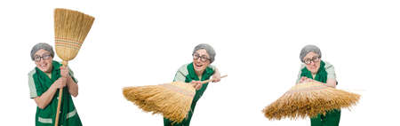 Woman with sweeping brush isolated on whiteの写真素材