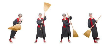 Woman with sweeping brush isolated on whiteの写真素材