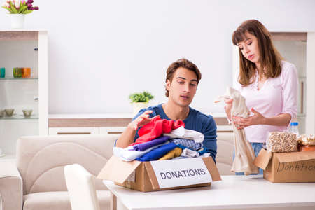 Concept of charity with donated clothingの写真素材