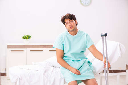 Young handsome man staying in hospitalの写真素材