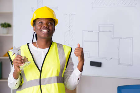 Young black architect working on projectの写真素材