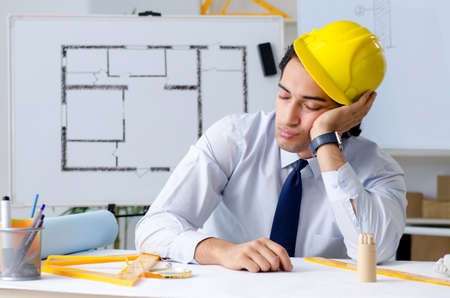 Young handsome architect working on the projectの写真素材