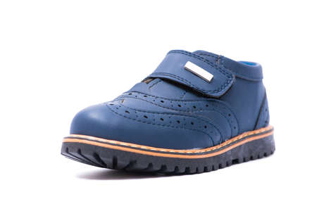 Blue baby shoes isolated on white backgroundの写真素材