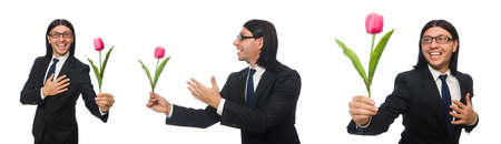 Handsome businessman with flower isolated on whiteの写真素材