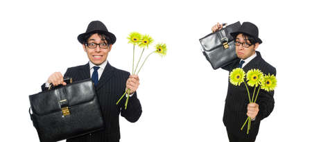 Young man in black costume with flower isolated on whiteの写真素材
