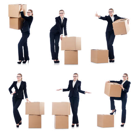 Businesswoman with boxes isolated on whiteの写真素材