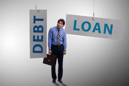 Businessman in debt and loan conceptの写真素材