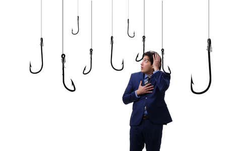 Businessman being tempted to bite the baitの写真素材