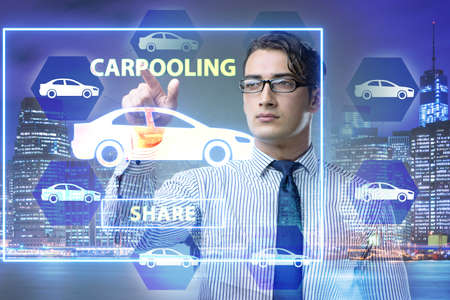 Businessman in carpooling and carsharing conceptの写真素材