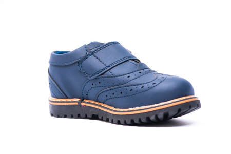 Blue baby shoes isolated on white backgroundの写真素材