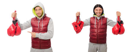 Man wearing boxing gloves isolated on whiteの写真素材
