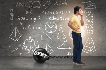 Student in loan and expensive education conceptの写真素材