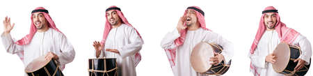 Arab man with drum isolated on whiteの写真素材