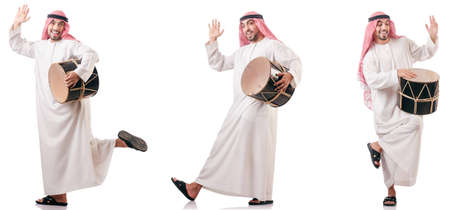Arab man with drum isolated on whiteの写真素材