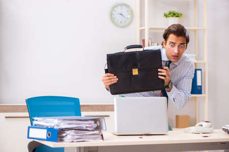 Businessman disgusted with cockroaches in the officeの写真素材