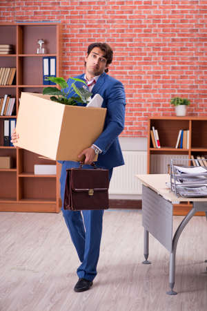 Young person being fired from his workの写真素材
