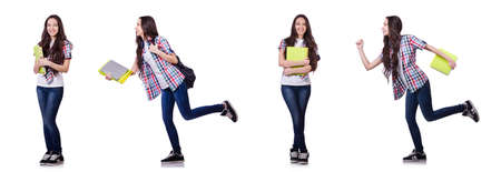 Young student with books isolated on the whiteの写真素材