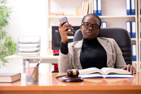 Black female lawyer in courthouseの写真素材
