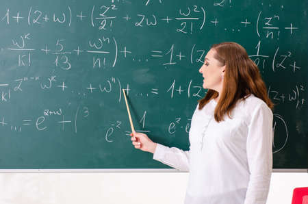 Female math teacher in the classroom