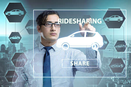 Businessman in carpooling and carsharing conceptの写真素材
