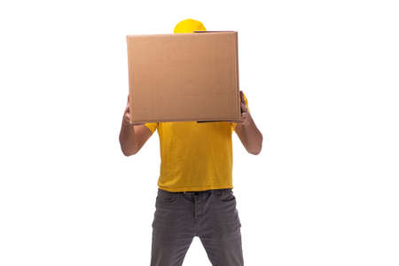 Young male courier with box