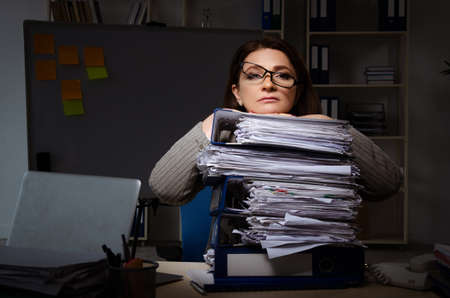 Female employee suffering from excessive work