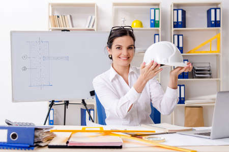 Female architect working in the officeの写真素材