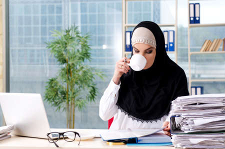 Woman muslim employee working in the officeの写真素材