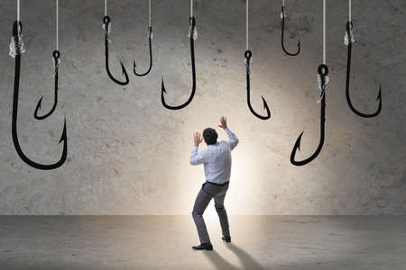 Businessman being tempted to bite the bait