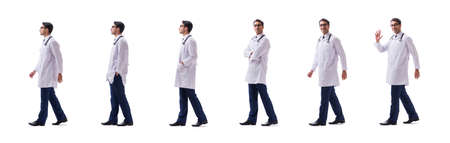 Young doctor physician standing walking isolated on white backgroundの写真素材