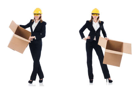 Woman builder with box isolated on whiteの写真素材