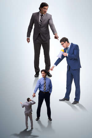 Businessmen blaming each other for failuresの写真素材
