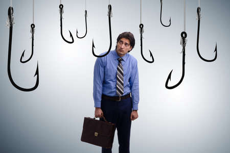 Businessman being tempted to bite the bait